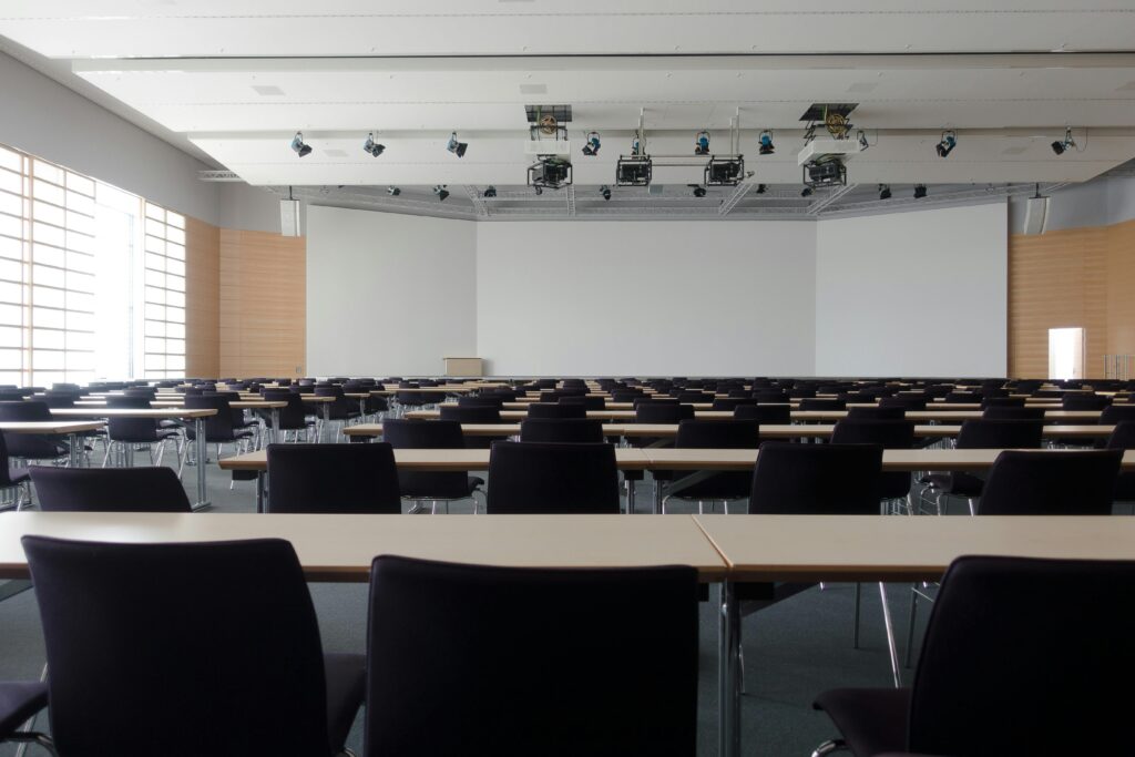Classroom with desks and a white board